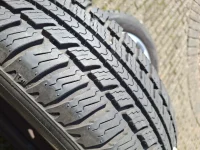 4 winterbanden 165/70 R14 profiel ~ 6mm op stalen velgen met Opel wieldoppen